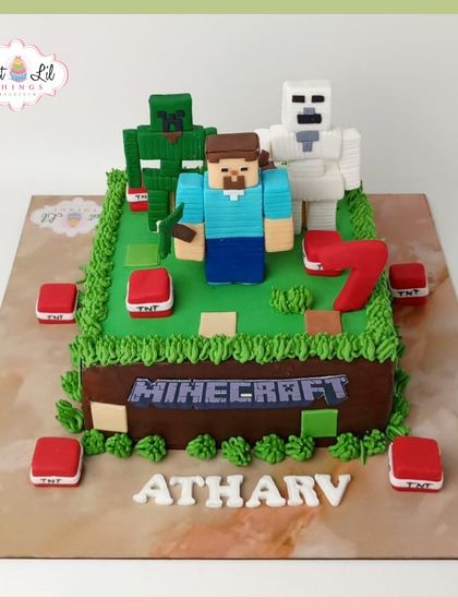A gamer's paradise in cake form. This Minecraft-themed cake features Steve, a Creeper, and TNT blocks on a classic pixelated landscape, perfect for a 7th birthday.