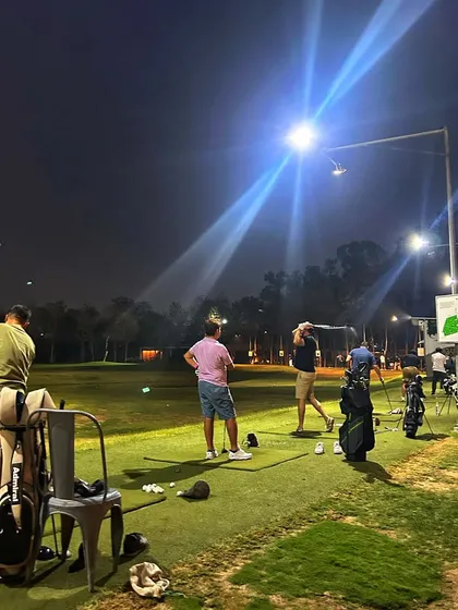 The range is a ritual. Under the lights, the focus sharpens and the rest of the world fades away.