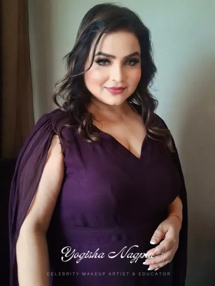 Another angle of this lovely soft glam makeup. The side profile highlights the gentle contouring and the soft waves in her hair, completing the look.