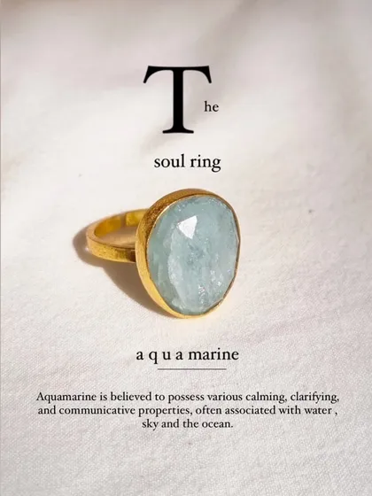 This is my Aquamarine Soul Ring. I designed it as a statement piece that carries the calming, clarifying energy of the ocean. The natural, irregular cut of the aquamarine stone makes each ring unique, just like the person who wears it.