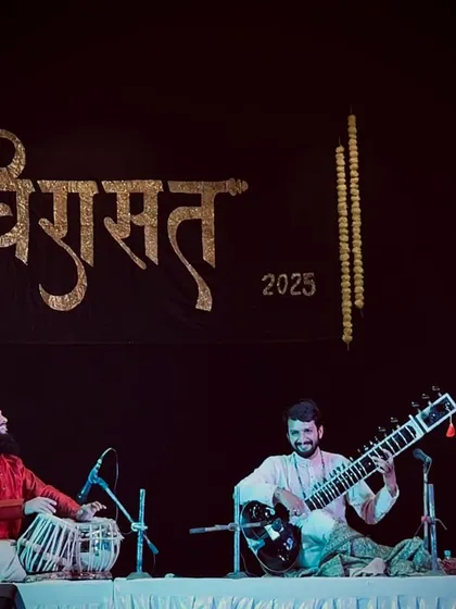 A moment of shared joy and musical connection with sitarist Varadraj Bhosale during our duet at the Virasat festival.