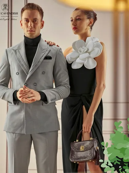 A campaign for John Cavendish featuring sophisticated power dressing. I styled the male model in a sharp grey double-breasted suit and the female model in a contrasting black dress with a bold floral accent to create a visually balanced and elegant composition.