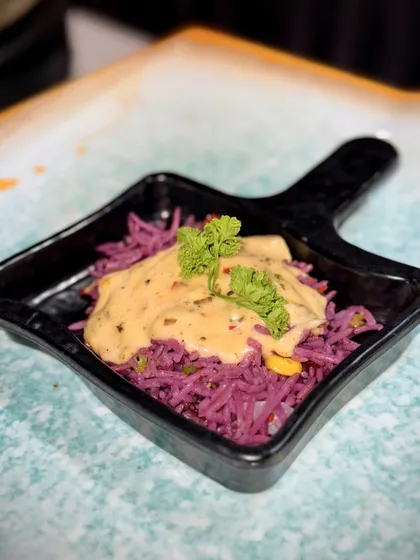 My Purple Rice with Paprika Sauce is as beautiful as it is delicious. The naturally coloured rice is tossed with vegetables and topped with a creamy, smoky paprika sauce, creating a visually stunning and flavourful dish.