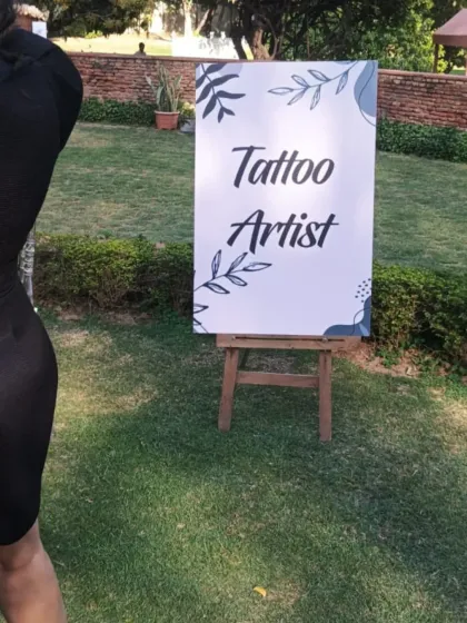 A clear and simple setup for our tattoo artist station at an outdoor event, ready to welcome guests.