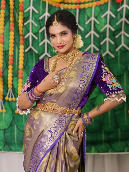 A stunning bride in a rich purple saree, adorned with a full set of my antique jewellery. The contrast of colors is beautiful.