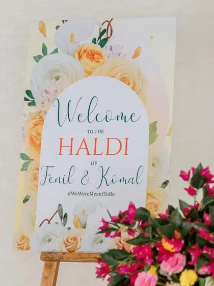 The welcome signage for a Haldi ceremony, featuring a beautiful floral design that sets the tone for the event.