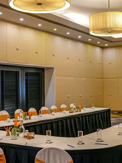 Beyond the parties and pop-ups, we provide sophisticated, fully-equipped spaces for productive business meetings. This U-shaped setup in our banquet hall is designed for collaboration and focused discussion.