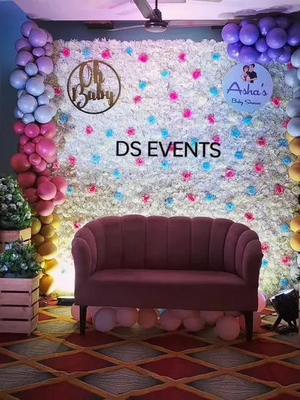 This is one of my popular baby shower designs. It features a full floral wall with pops of color, elegant balloon garlands, and a custom "Oh Baby" sign, creating the perfect photo backdrop for the parents-to-be.