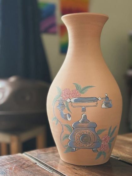 A few of my favorite finished vases from a recent collection, featuring a variety of glazes, painted details, and forms. Each one has its own personality.