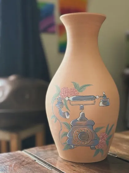 A few of my favorite finished vases from a recent collection, featuring a variety of glazes, painted details, and forms. Each one has its own personality.