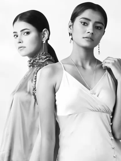 I also direct shoots with multiple models to create cohesive editorial or campaign images. This black and white portrait of two models demonstrates a high-fashion aesthetic, focusing on composition and shared mood for a powerful and elegant result.