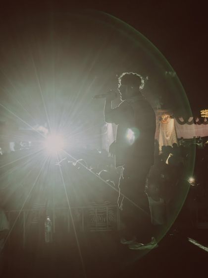 A silhouette against the stage light. Sometimes the vibe is just about the music and the atmosphere.