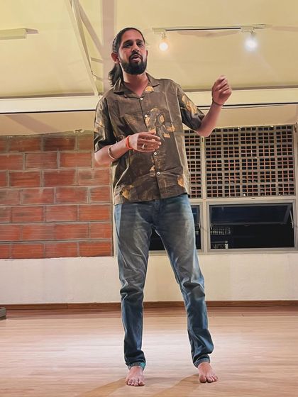 A storyteller sharing his art at the Uncut showcase. Our platform is open to all forms of expression, including spoken word and monologues.