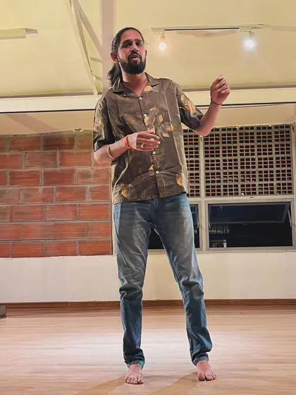 A storyteller sharing his art at the Uncut showcase. Our platform is open to all forms of expression, including spoken word and monologues.