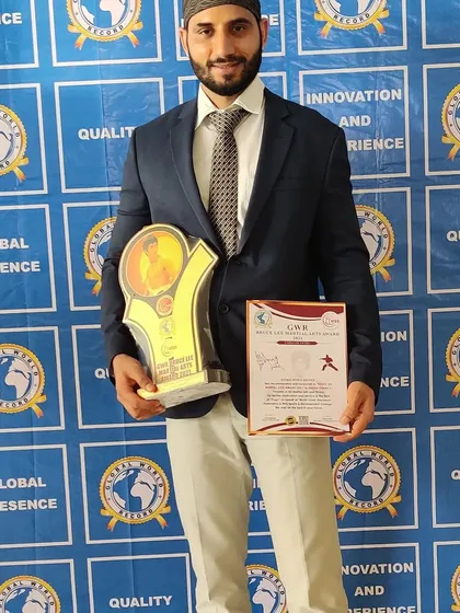 I was honored to receive the Bruce Lee Martial Arts Award in recognition of my dedication to the sport. It is a privilege to share my passion and experience with the next generation of martial artists.