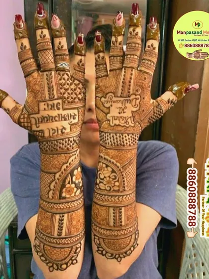 A beautiful back-of-hand design with the blessing 'Sada Saubhagyavati Bhava' and the groom's name 'Rahul'. This is a traditional and meaningful choice for a bride.
