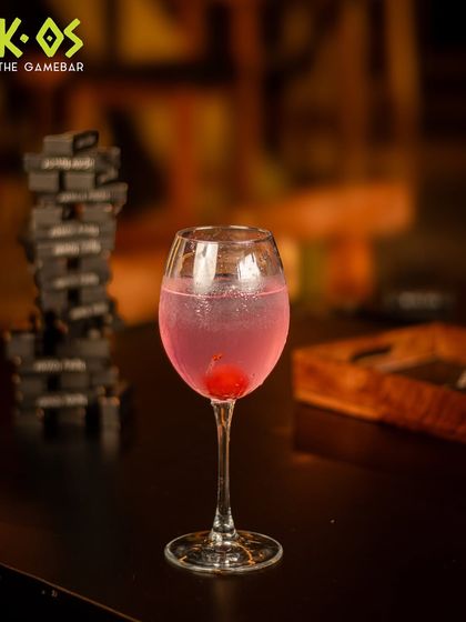 Bold, vibrant, and bursting with flavor. This cherry-topped pink gin cocktail is as unique as you are.