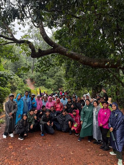 A large group photo on a muddy trail, showing the scale of our Kodachadri adventures.