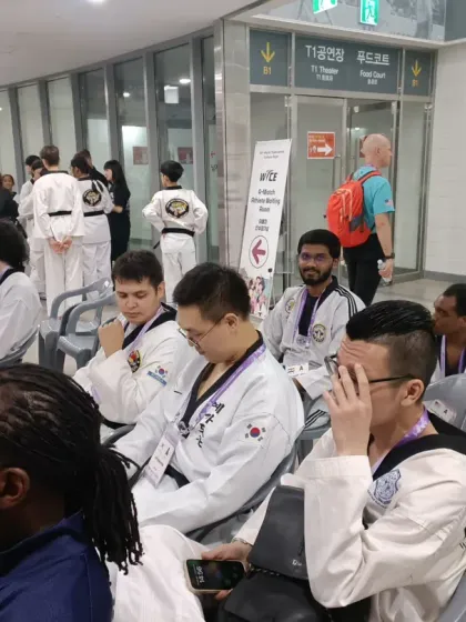With fellow practitioners from around the world, waiting for our turn to train or compete.