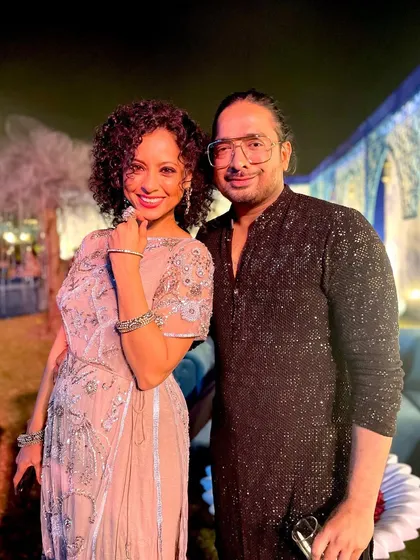 A candid moment with a key team member. We work together for months to plan and execute every detail of a wedding performance, ensuring a seamless and spectacular show.