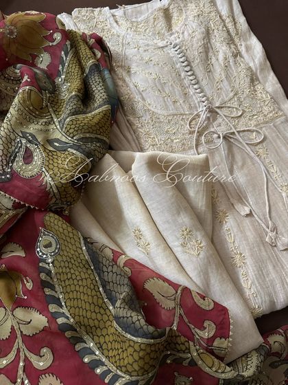 Our Tissue Chanderi Achkan Anarkali, presented as a complete set. This image shows the Anarkali with its coordinated dupatta and a contrasting hand-painted Kalamkari dupatta, illustrating different styling options.