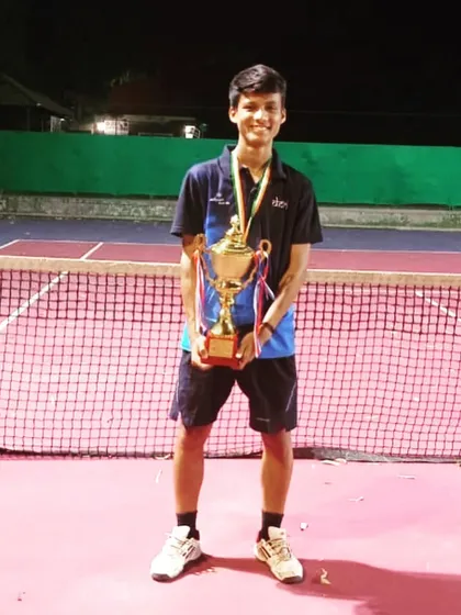 Vansh with his trophy after winning the silver medal at the National School Games.