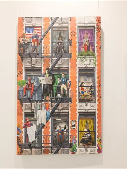 The full canvas of 'Ordinary Powers' by Sanuj B. This artwork transforms a city building into a vibrant tableau of superhero life, blending the extraordinary with the everyday.