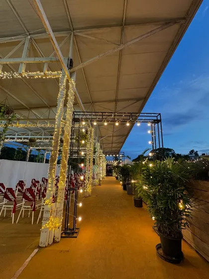 The entrance walkway to the Sky Terrace lit up at dusk, creating a welcoming and magical path for your guests.
