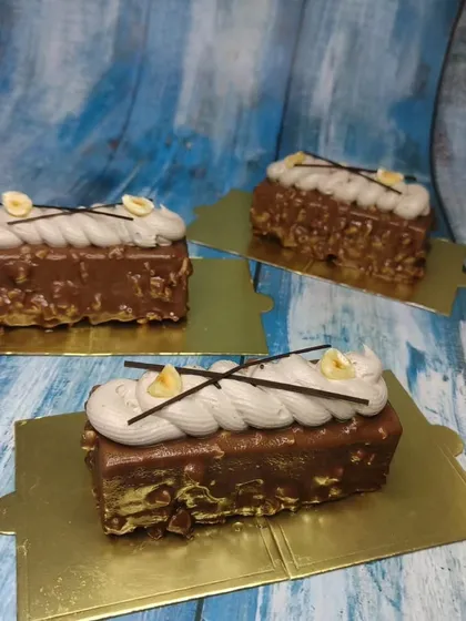 These hazelnut mousse pastries are a perfect example of the sophisticated desserts you will learn to make. We focus on texture, flavor balance, and professional presentation.
