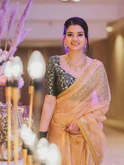 Smokey eyes for this stunning golden saree look, perfect for a reception or cocktail event.