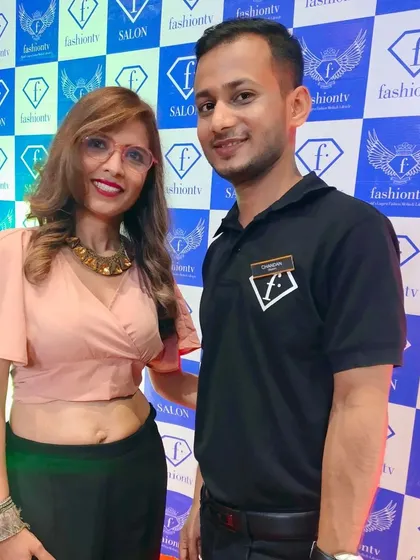A picture with a client at a Fashion TV salon event. It's always great to be part of fashion and beauty events.