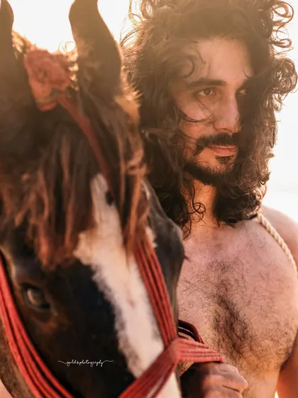 An editorial-style male portrait captured at the beach during golden hour. The goal was to create a raw, untamed look, using the natural elements of the wind and the horse to add a sense of power and freedom. This showcases my ability to direct and capture dynamic on-location shoots.