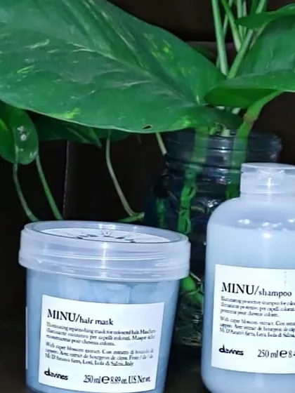 The Davines MINU shampoo and hair mask duo is perfect for post-color care, ensuring your investment stays bright and beautiful.
