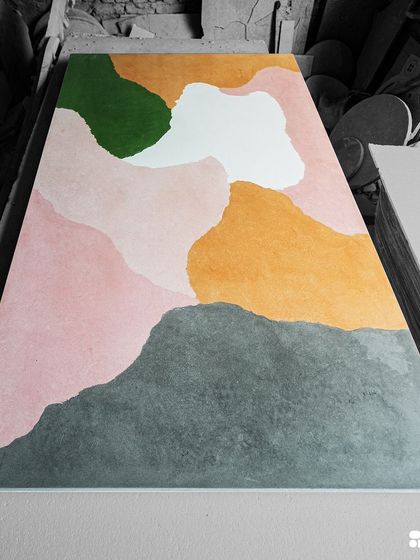 Another angle of the custom concrete slab, highlighting the organic flow of the different colored sections.