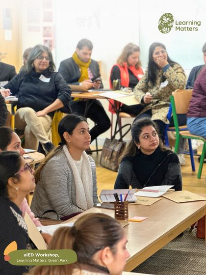 Participants at our workshop listen intently, reflecting on how new technologies can be integrated into their classrooms. Our professional development sessions are designed to be thought-provoking and practical.