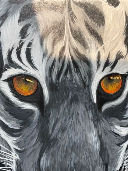 A final, striking close up of the tiger's eyes. The detail and realism in the eyes are central to the mural's impact, reflecting my dedication to the hyperrealism style in wildlife art.