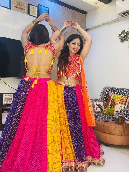 A vibrant and colorful multi-panel chanya choli with bandhani print, perfect for making a statement on the dance floor.