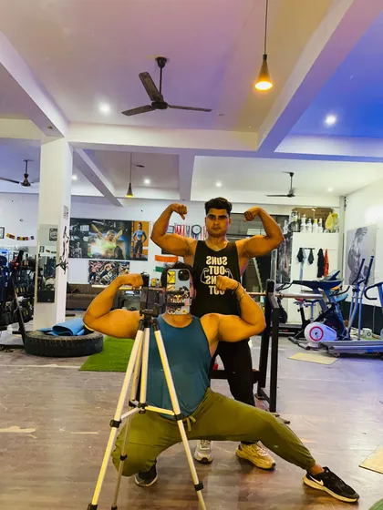 Posing with my brother at the gym. Having a strong training partner makes all the difference.