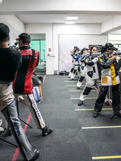 The energy at our academy is one of collective ambition. This is a typical training day, with every lane occupied by dedicated rifle shooters pushing their limits under expert guidance.