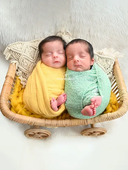 Double the joy, double the love. I have special experience in photographing newborn twins, ensuring both are comfortable and captured beautifully together in coordinated, peaceful poses.