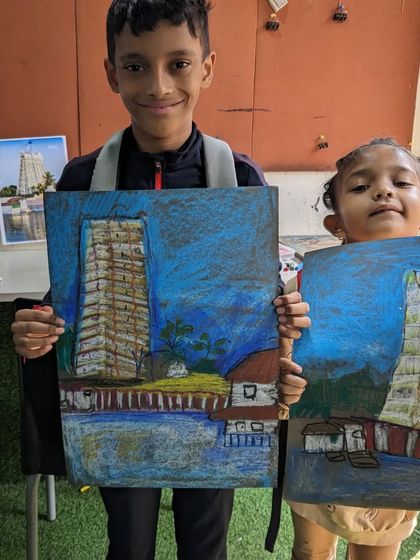 A closer look at the temple paintings. Both students did a wonderful job capturing the details of the gopuram (temple tower).