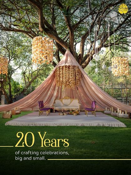 For 20 years, we've been crafting celebrations big and small. This image of a grand mandap represents our legacy of creating beautiful, memorable events.