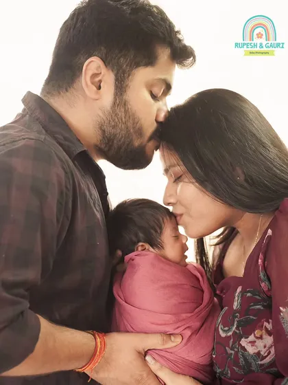 The quiet moments right after birth are so precious. We capture the profound connection between parents and their newborn in these intimate family portraits.