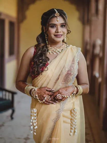 A portrait of the bride in Jodhpur, looking elegant in her custom floral jewellery.