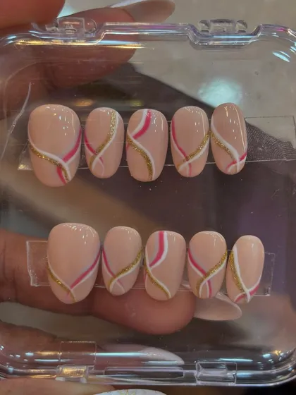 Another gorgeous set from a workshop, featuring elegant swirls in pink, white, and gold glitter.