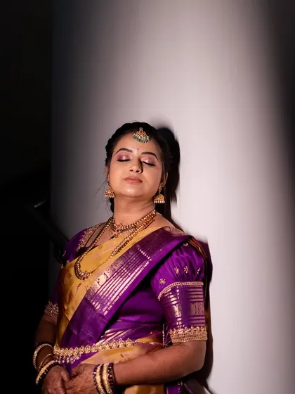 A duplicate of 220, a creative shot of Varshini with her eyes closed.