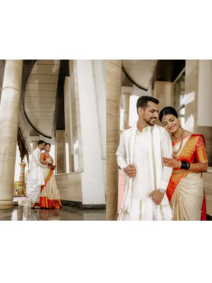 A diptych showing the couple in a grand, modern hall, capturing both a wide shot and an intimate close-up.