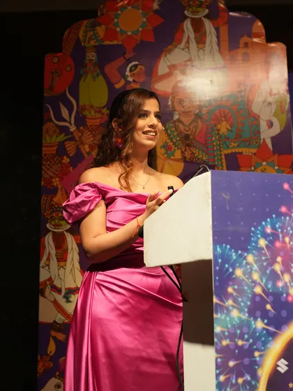 Another look from the podium at the Maruti Suzuki event. The colorful backdrop perfectly matched the festive mood of the evening.
