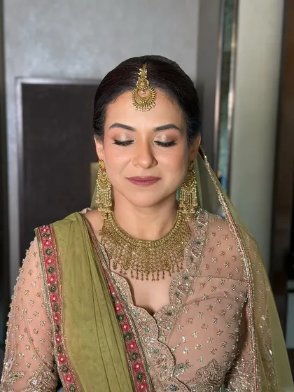 An eyes-closed portrait to showcase the beautifully blended eyeshadow and the bride's serene expression.