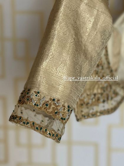 A close-up of the sheer cuff detail.